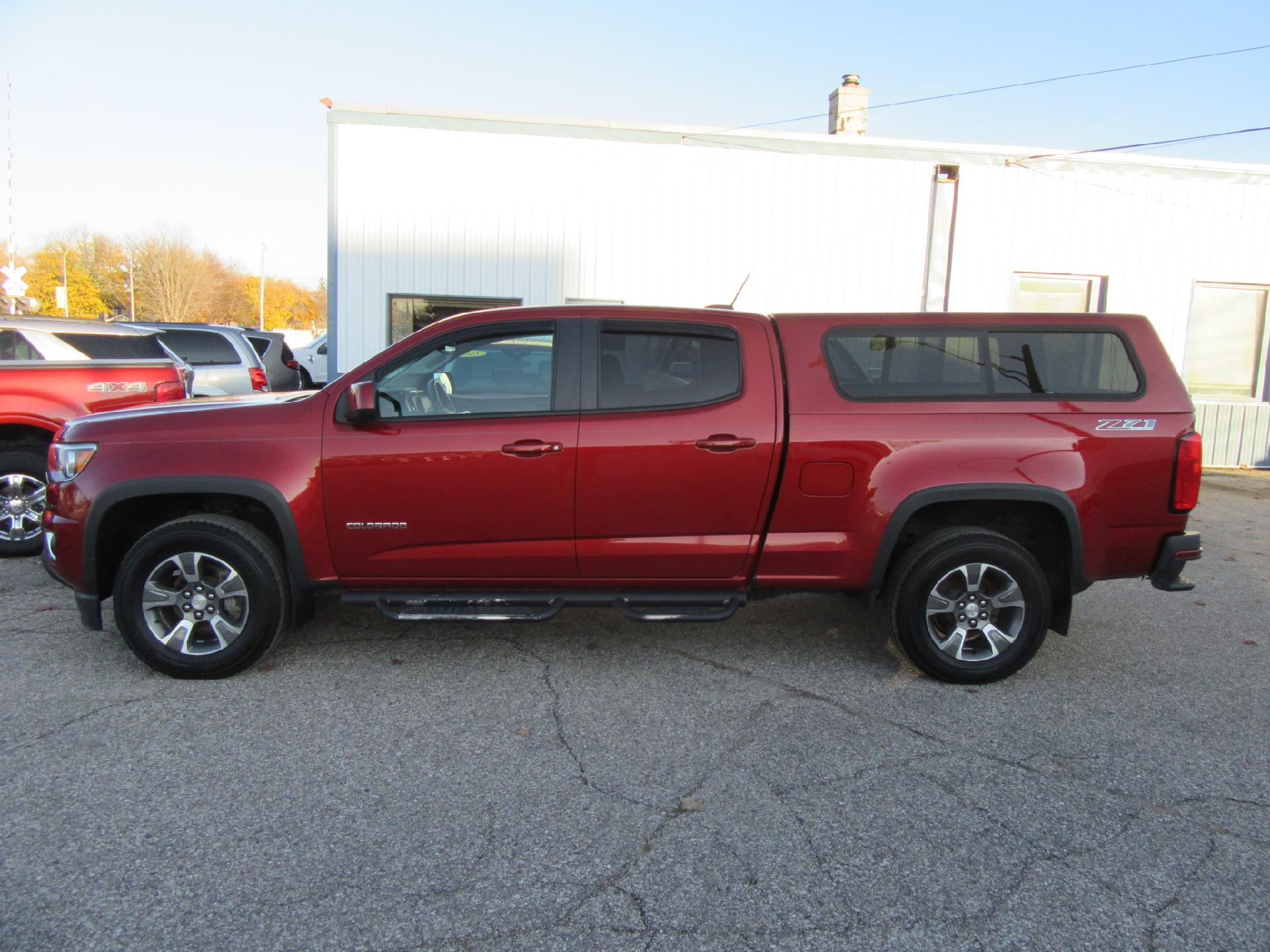 Used 2015 Chevrolet Colorado Z71 with VIN 1GCGTCE38F1124658 for sale in Emmetsburg, IA