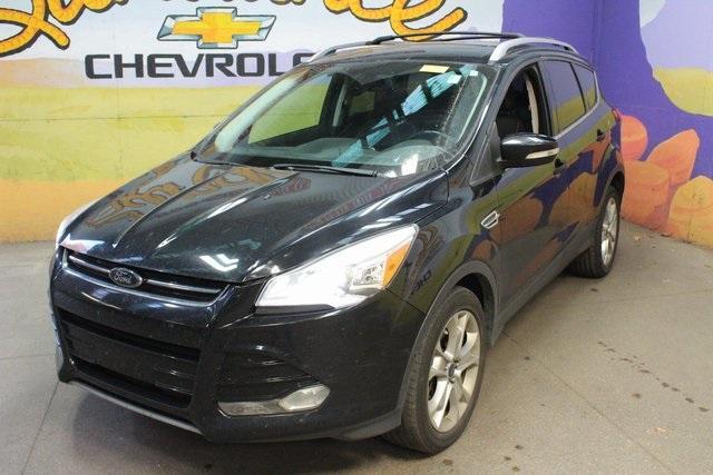 Used 2016 Ford Escape Titanium with VIN 1FMCU9J90GUC09255 for sale in Grand Ledge, MI