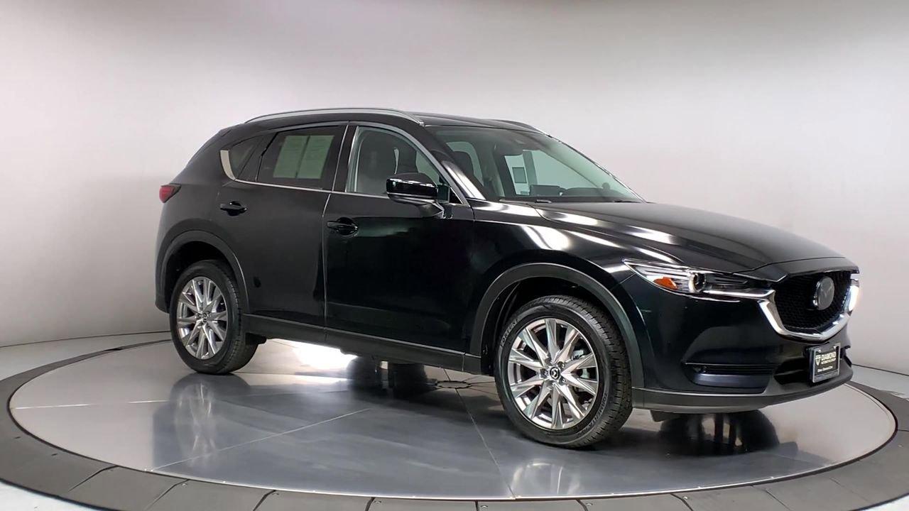 Used 2021 Mazda CX-5 Grand Touring with VIN JM3KFADM2M0400147 for sale in Lancaster, CA