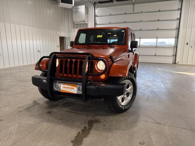 Used 2014 Jeep Wrangler Unlimited Sahara with VIN 1C4BJWEG7EL303345 for sale in Glenwood, Minnesota