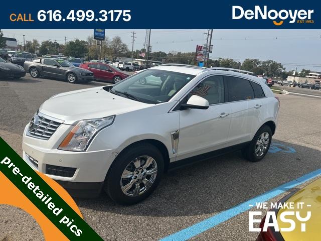 Used 2015 Cadillac SRX Luxury Collection with VIN 3GYFNEE36FS567711 for sale in Holland, MI