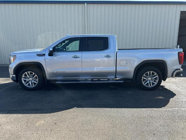 Used 2021 GMC Sierra 1500 SLT with VIN 1GTU9DEL4MZ221829 for sale in Scott City, KS