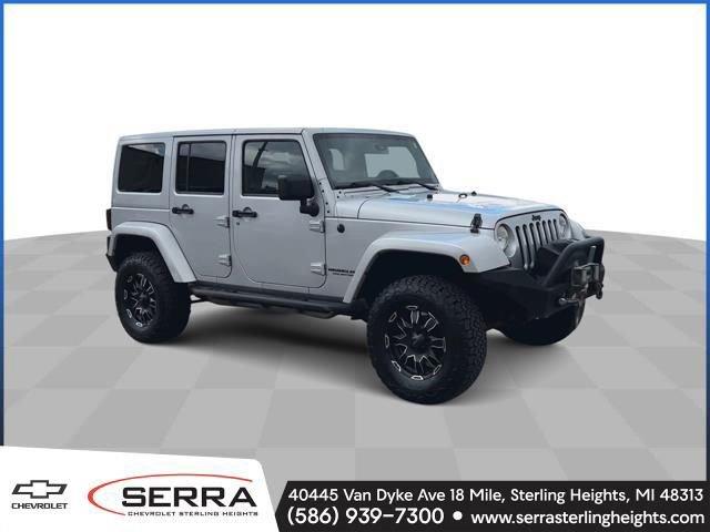 Used 2012 Jeep Wrangler Unlimited Sahara with VIN 1C4BJWEG5CL267104 for sale in Sterling Heights, MI