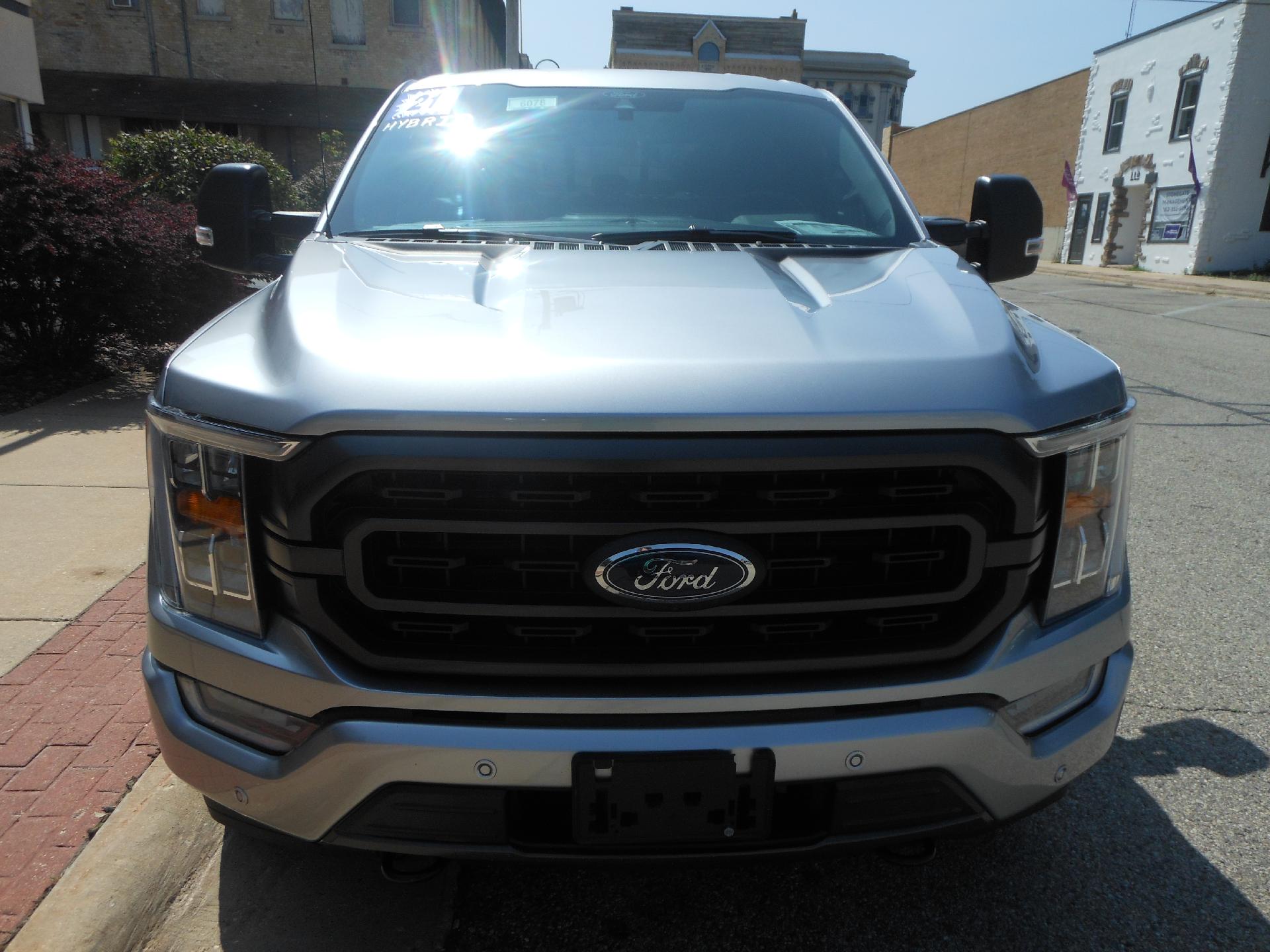 Used 2021 Ford F-150 XLT with VIN 1FTFW1ED4MFB25547 for sale in Whitewater, WI