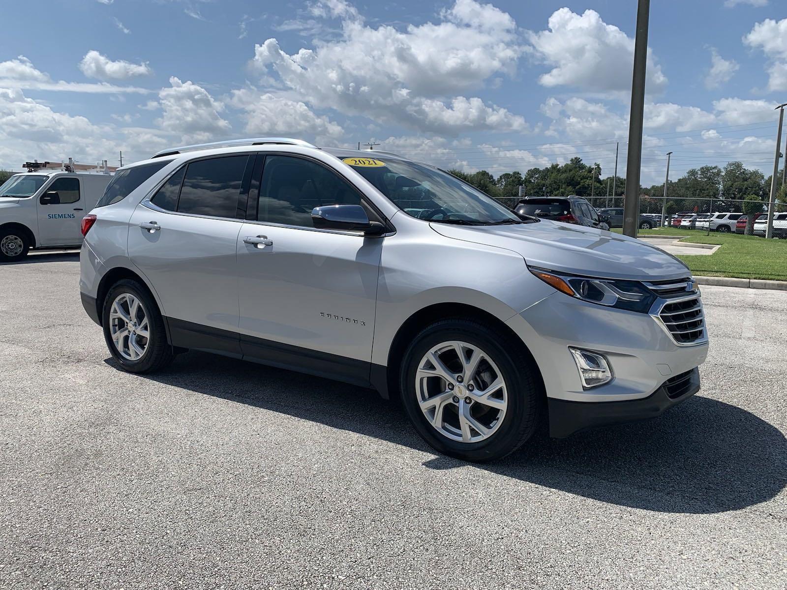 Used 2021 Chevrolet Equinox Premier with VIN 3GNAXNEV1MS102043 for sale in Winter Haven, FL