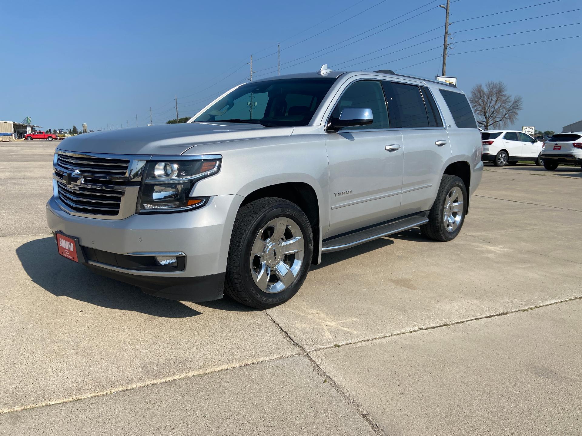 Used 2016 Chevrolet Tahoe LTZ with VIN 1GNSKCKC0GR133110 for sale in Sac City, IA