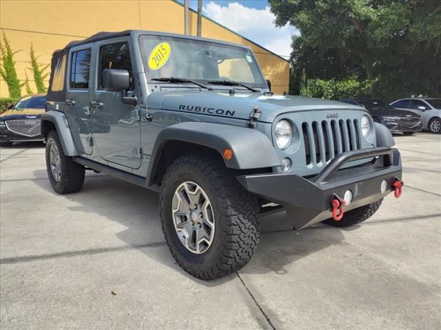 Used 2015 Jeep Wrangler Unlimited Rubicon with VIN 1C4BJWFG9FL579459 for sale in Melbourne, FL