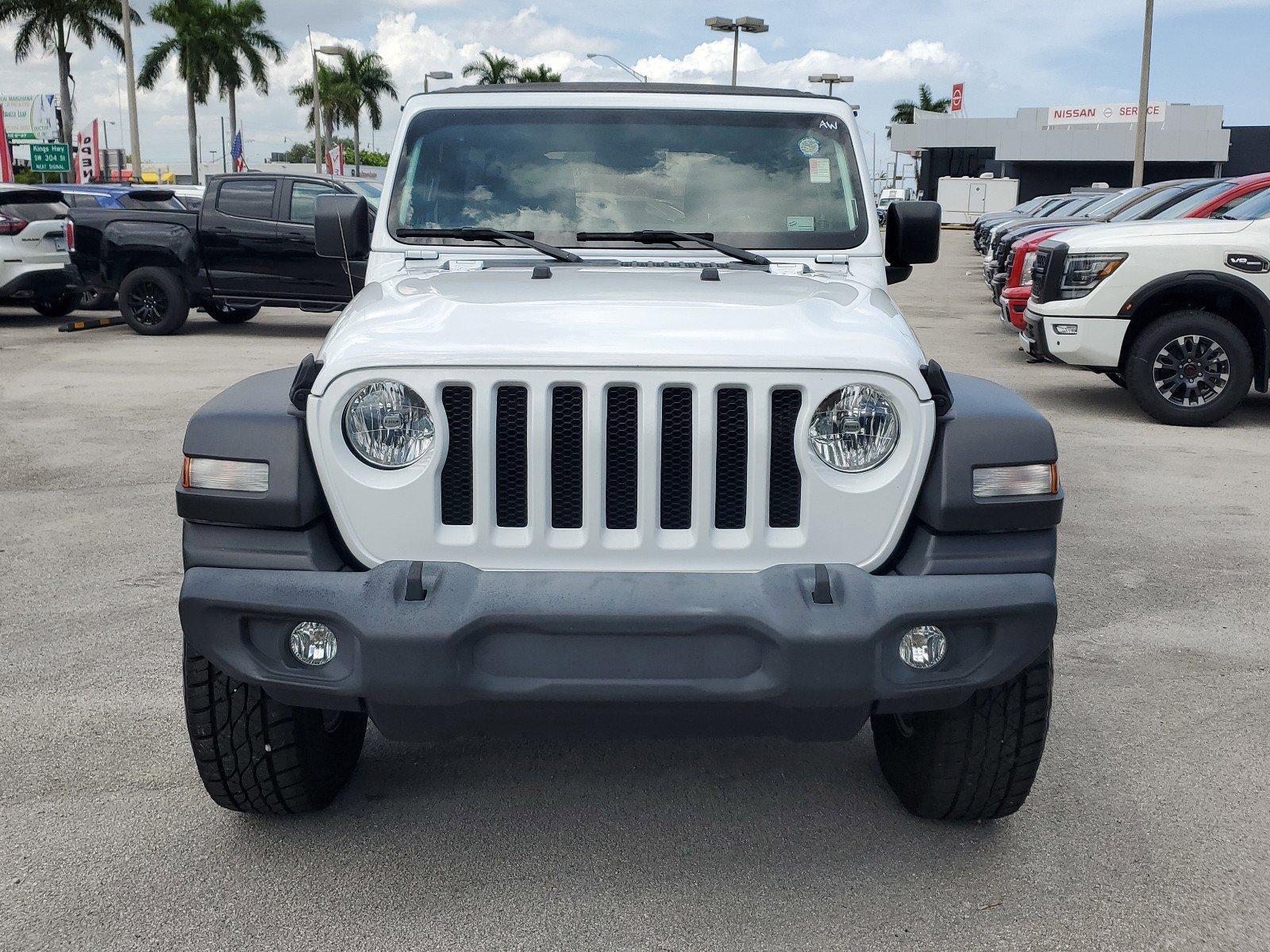 Used 2021 Jeep Wrangler Unlimited Sport with VIN 1C4HJXDG7MW529027 for sale in Homestead, FL