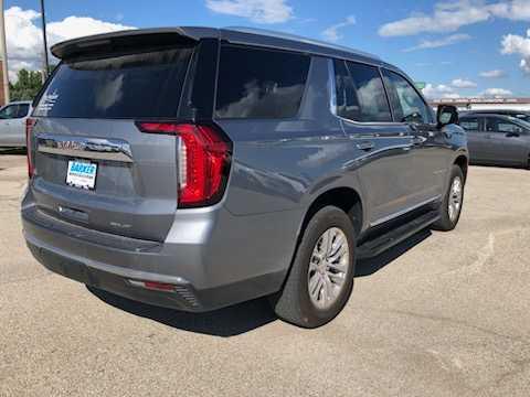 Used 2021 GMC Yukon SLT with VIN 1GKS2BKDXMR409014 for sale in Bloomington, IL