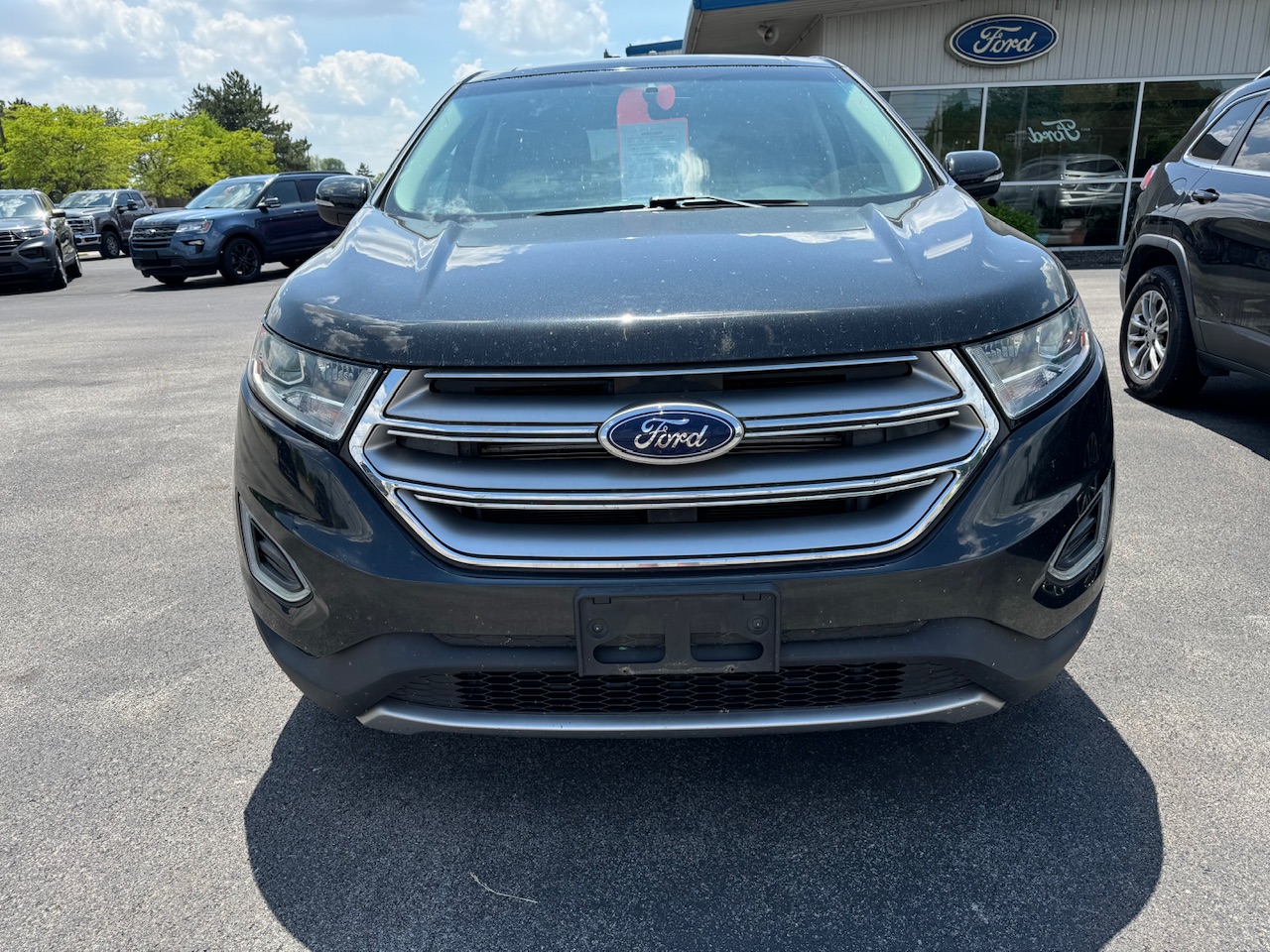 Used 2015 Ford Edge Titanium with VIN 2FMTK4K87FBC02709 for sale in Bellevue, OH