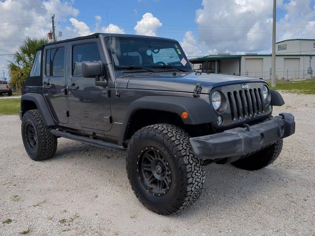 Used 2017 Jeep Wrangler Unlimited Sport with VIN 1C4BJWDG7HL522442 for sale in Belle Glade, FL