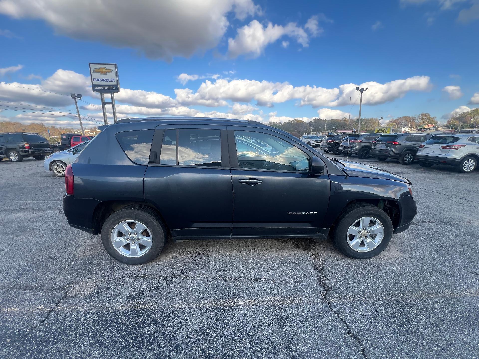 Used 2014 Jeep Compass Sport with VIN 1C4NJCBA6ED803647 for sale in Doniphan, MO