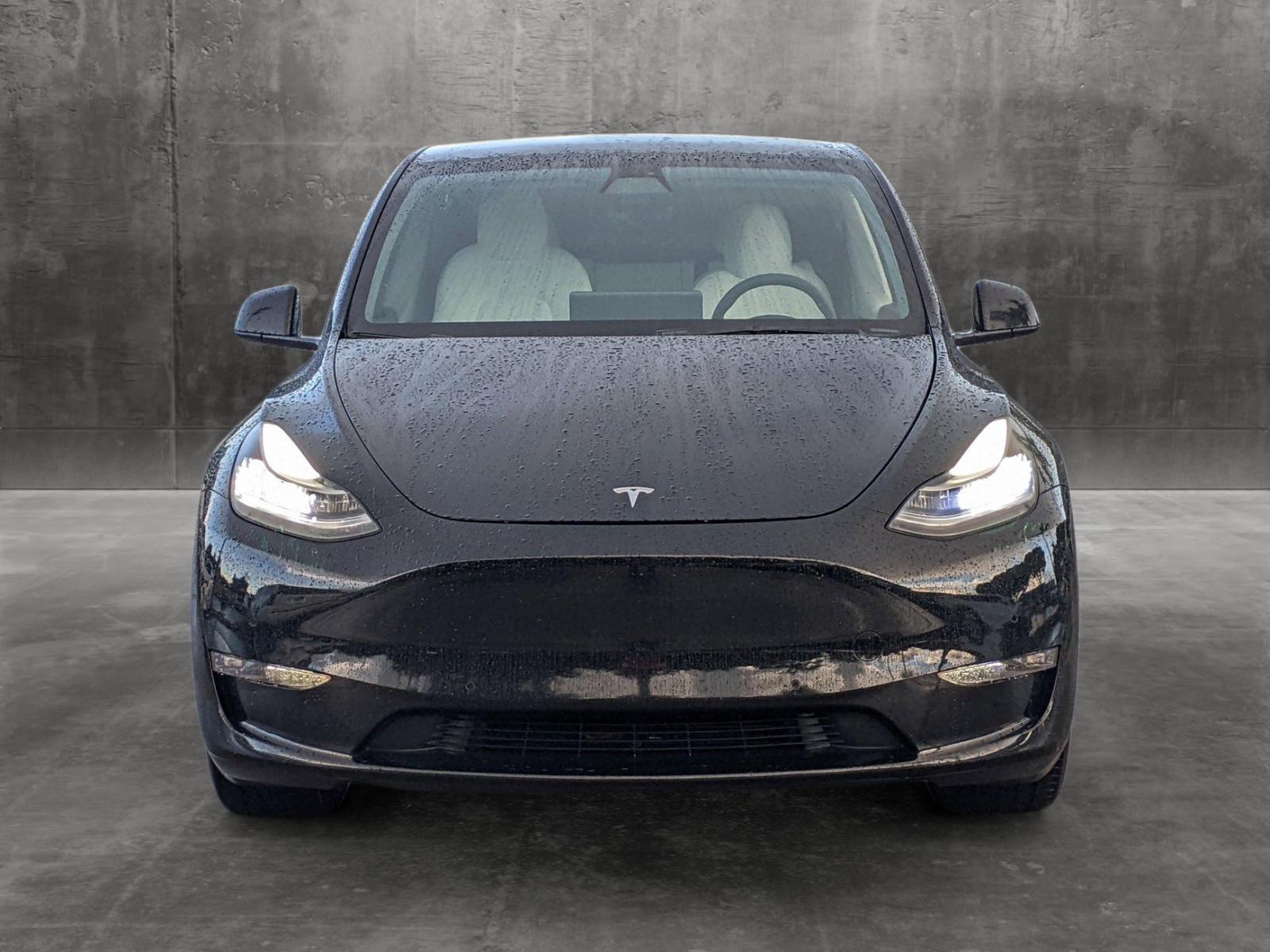 Used 2021 Tesla Model Y Standard Range with VIN 5YJYGAED4MF210768 for sale in Pembroke Pines, FL