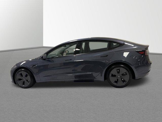 Used 2022 Tesla Model 3 Long Range with VIN 5YJ3E1EBXNF327447 for sale in Orlando, FL