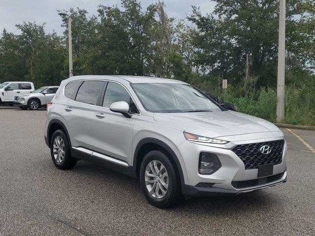 Used 2019 Hyundai Santa Fe SE with VIN 5NMS23AD9KH099930 for sale in Clermont, FL