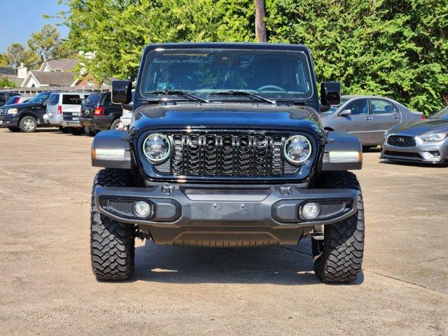 Used 2024 Jeep Wrangler 4-Door Willys with VIN 1C4PJXDNXRW156440 for sale in HOUSTON, TX