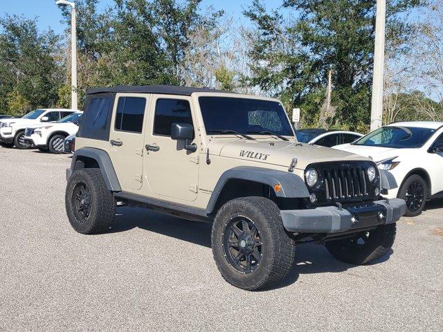 Used 2018 Jeep Wrangler JK Unlimited Willys Wheeler with VIN 1C4BJWDG1JL836769 for sale in Clermont, FL