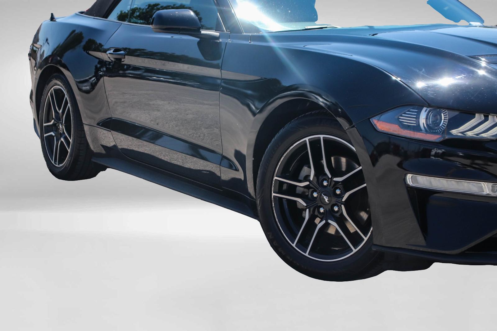 Used 2021 Ford Mustang EcoBoost Premium with VIN 1FATP8UH2M5120226 for sale in Austin, TX