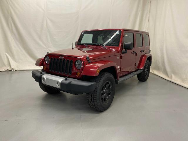 Used 2011 Jeep Wrangler Unlimited Sahara with VIN 1J4BA5H12BL560923 for sale in Fremont, MI